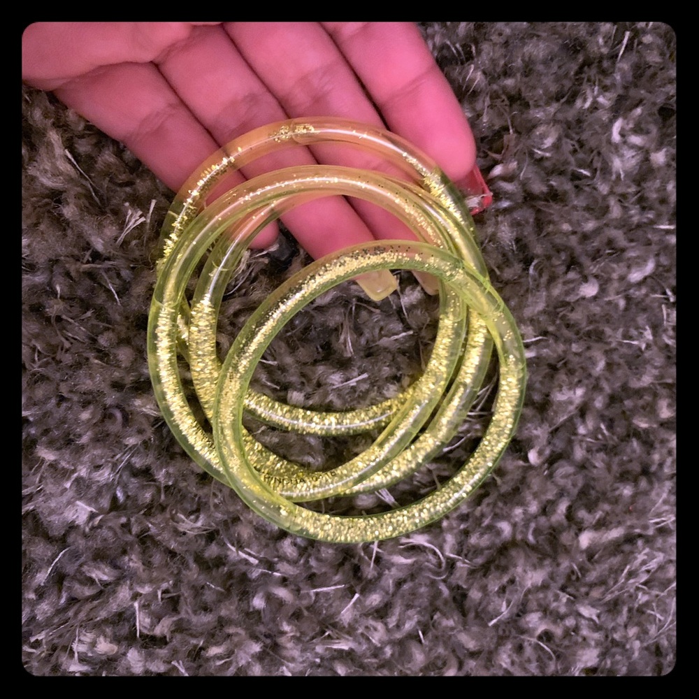 Nostalgic Yellow Jelly Bangles. $10 each.